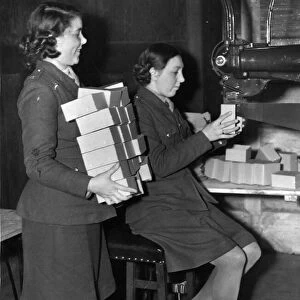 Royal Ordnance Factory. Private M Webster with Private Elsie Bolton, both of Liverpool