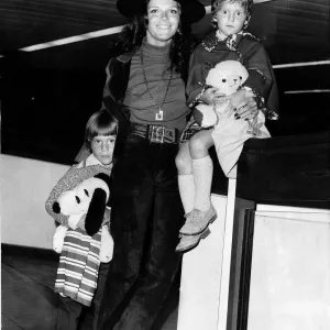 Samantha Eggar actress with her children Nicholas and Jenna arriving at Heathrow