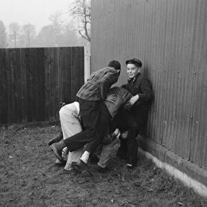 Schoolboys of Cheam School playing a game called Hi Jimmy Nacher. 1st December 1958