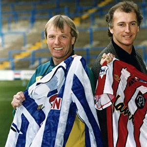 Sheffield United football manager Dave Bassett stands with Sheffield Wednesday manager