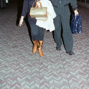 Singer Tom Jones and his wife Linda at Heathrow Airport. 16th May 1992