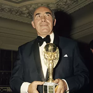 Sir Alf Ramsey seen here with a replica of the 1966 World Cup for his testimonial dinner