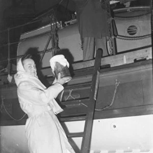 Sister Clevely stepping aboard the SENNEN lifeboat january 1952 C134 / 2