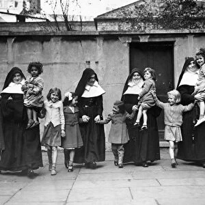 Sisters of Mercy looking after the homeless children of the East End of London