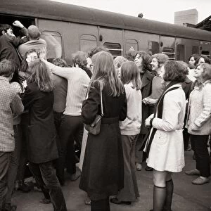 Sixty-five people cram themselves into one tiny railway compartment