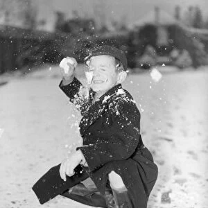 Snowball Fight Petts Wood, Kent Child, Boy is hit in the face with a snowball