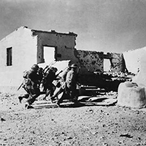 South African troops charging a house in Sollum during the Second World War