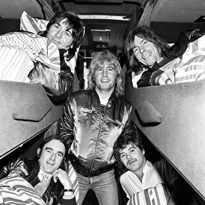 Status Quo and their new £150 000 coach which they will use for their final world