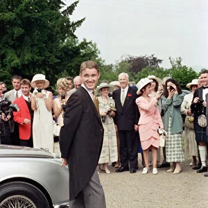 Stephen Hendry arrives at his wedding with on looking guest s. Circa 1995