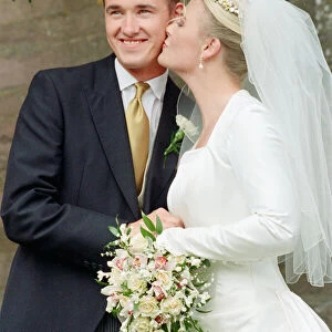 Stephen Hendry gets a kiss on the cheek from wife Mandy on their wedding day