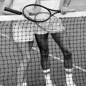 Sue Barker and Cliff Richard laughing during tennis match - October 1983