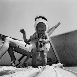 Susan May seen here with her mothers camera on Plymouth Hoe. Mother in deckchair