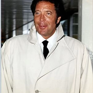 Tom Jones Singer Wearing a White coat