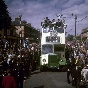 Tottenham Hotspur team return to Tottenham in an open top double decker bus with the FA