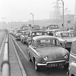 Traffic in Dagenham as the Ford factory turns out at the end of the day shift