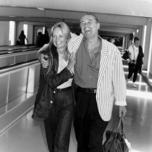 Twiggy actress with husband Leigh Lawson at London Airport A©Mirrorpix