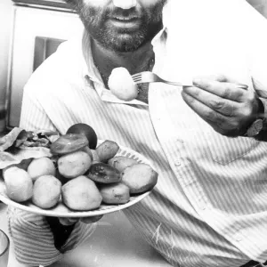 Ulster Soccer Idol George Best July 1987 Belfast boy George Best samples some spuds