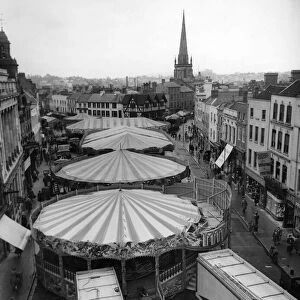 View of the Mop Fair taking place in High Town, Hereford, Circa 1950