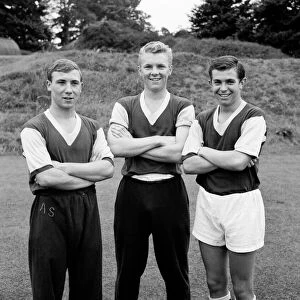 West Ham United footballer Bobby Moore pictured alongside teammates Andy Smillie (left