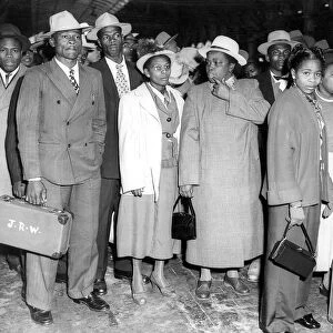 West Indian immigrants arriving at a London Terminal in 1962