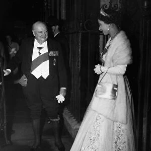 Winston Churchill escorts Queen Elizabeth to her car after dining at no 10 Downing Street
