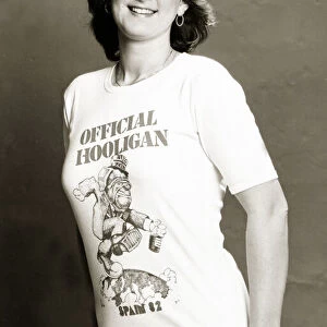 Woman wearing t-shirt reading Official Hooligan - Spain 1982