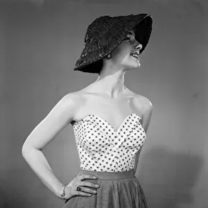 Womans Sunday Mirror Fashion competition No. 12. Sun tops from DH Evans worn by film