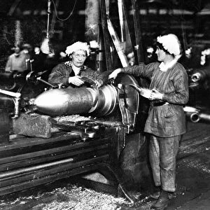 World War One WWI Munition factory making shells Women turning artillary