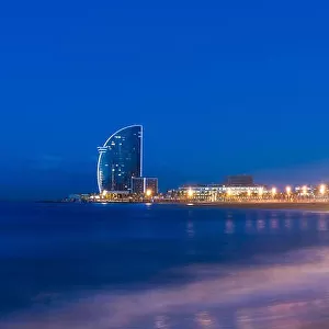 Barcelona Beach in summer night along seaside in Barcelona, Spain. Mediterranean Sea in Spain