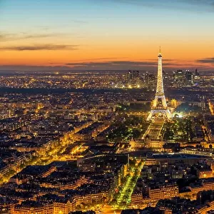 Beautiful view Eiffel tower during light show at dusk, Paris, France
