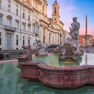 Fountains in Piazza Navona in Rome, Italy at twilight