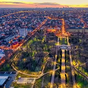 Galati, Romania - February 28, 2021: Aerial view of Galati City, Romania, at sunset with city lights on