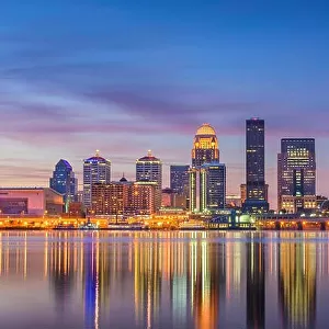 Louisville, Kentucky, USA downtown skyline at the river at dusk