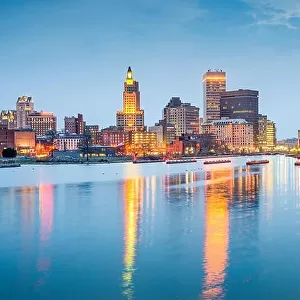 Providence, Rhode Island, USA city skyline on the Providence River at twilight