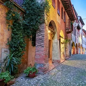 Treviso, Italy. Cityscape image of colorful street located in old town Treviso, Italy at sunset