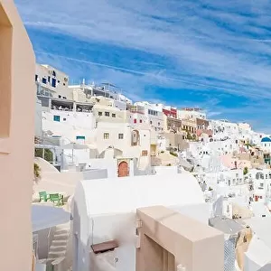 View of Oia the most beautiful village of Santorini island in Greece during summer. Greek landscape, adventure summer holiday