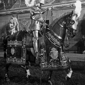 Knight on horseback wearing an original Italian suit of armor, in the Museo Stibbert, Florence