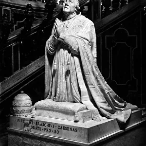 Pope Pius VI praying, statue by Antonio Canova, completed, after the death of the artist, by Adamo Tadolini and collocated in St. Peter's Cathedral, Vatican City, Rome