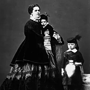 Portrait of young woman with two children
