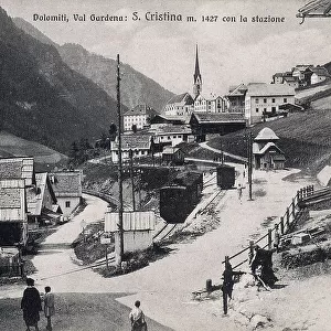 View of Santa Cristina in Val Gardena and its railway station