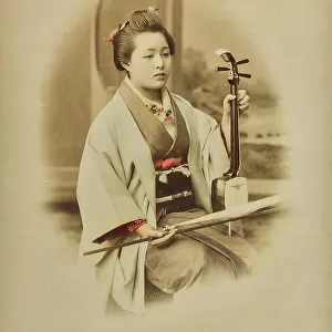 Young geisha with a kokyu, musical instrument arc