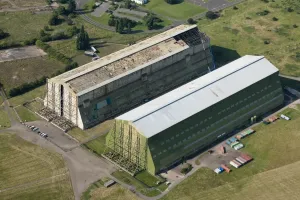 Prints of Airship hangars, RAF Cardington, Bedfordshire. No.1 shed was built in 1915 by Short Brothers to build two airships for the navy England from the Air - Landscapes, Cities and Heritage: Airship Hangars Print