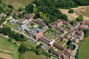 Prints of Douai Abbey, Woolhampton, Thatcham, Berkshire. Benedictine monastery, founded by French monks in 1903. The Abbey Church opened in 1933, and was finally completed in the 1990s. SU5768/14 England from the Air - Landscapes, Cities and Heritage: Print of Douai Abbey, a Benedictine monastery in Berkshire