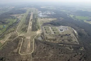 Prints of Greenham Common, West Berkshire. Former RAF and USaF airfield, with the GAMA Complex (cruise missile storage bunkers) to one side. The airfield was operational between 1942 and 1993 England from the Air - Landscapes, Cities and Heritage: Greenham Common Airfield Print, West Berkshire