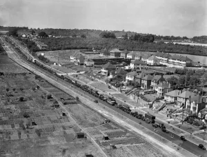Prints of A traffic jam on the outskirts of Rochester, Kent. Aerial view by Aeropictorial. Aerofilms Collection. July 1938 England from the Air - Landscapes, Cities and Heritage: Rochester, Kent Traffic Jam Print (July 1938)