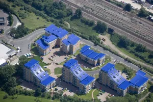 Prints of READING, Berkshire. Aerial view. A development of modern executive flats off Kenavon Drive near to the London-Bristol main line Aerial Views of England - Landscapes, Cities and Heritage from Above: Aerial view of Modern urban development Print