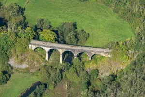 Prints of Monsal Dale Viaduct, a railway viaduct denounced by Ruskin for its impact on the natural beauty of the Wye valley, Derbyshire, 2024 Aerial Views of England - Landscapes, Cities and Heritage from Above: Monsal Dale Viaduct Print