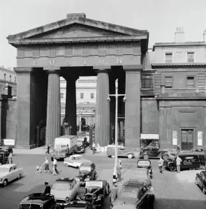 Prints of EUSTON ARCH, Euston Station, Euston Road, Camden Town, London. Traffic outside the Euston Arch Iconic Photographers of England - Historic Image Collections: Euston Arch Print, 1960