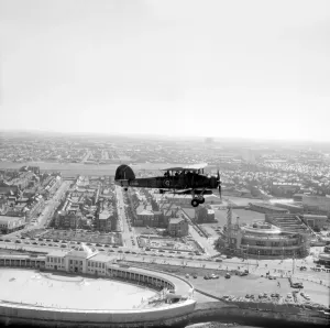 Prints of A Fairey Swordfish Mk.II flying over Blackpool in 1971. This type of torpedo bomber was used by the Fleet Air Arm of the Royal Navy during World War 2 Aerial Views of England - Landscapes, Cities and Heritage from Above: Fairey Swordfish Mk.II Print