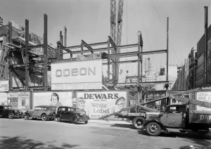 Prints of ODEON CINEMA, Leicester Square, London. A photograph taken by John Maltby on 11th June 1937 of the buiding works for the Odeon cinema on the site of the Alhambra Theatre Engineering And Construction Prints: Print of Odeon cinema construction, Leicester Square, London